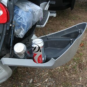 Gene's proof to Ann, this soda didn't fall out of his saddle bag!