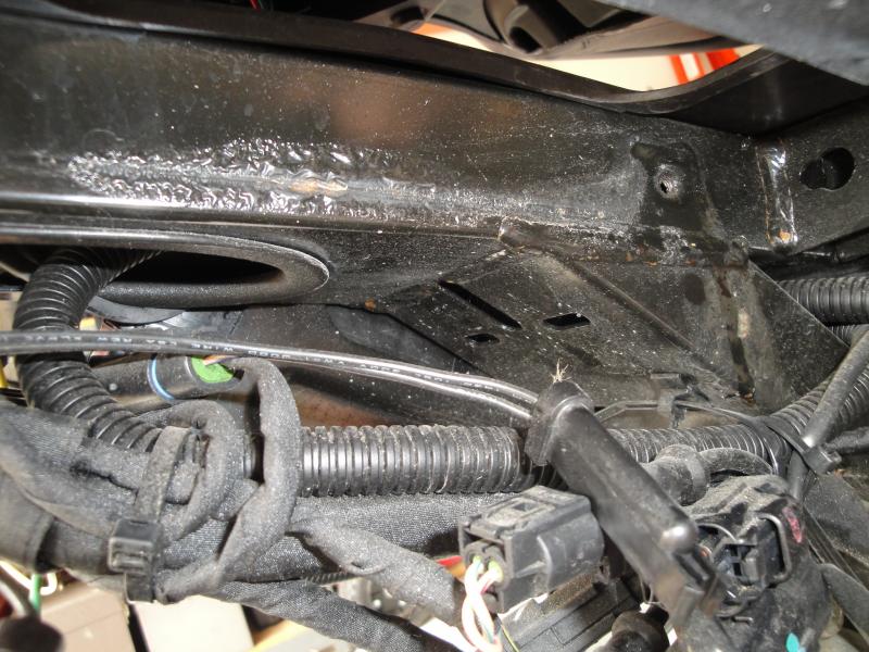 Corrosion behind brake fluid reservoir.