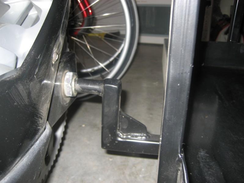 rear mounting arm through axle