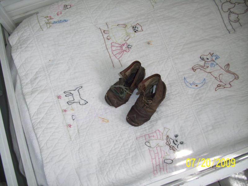 Very old childs leather boots.
